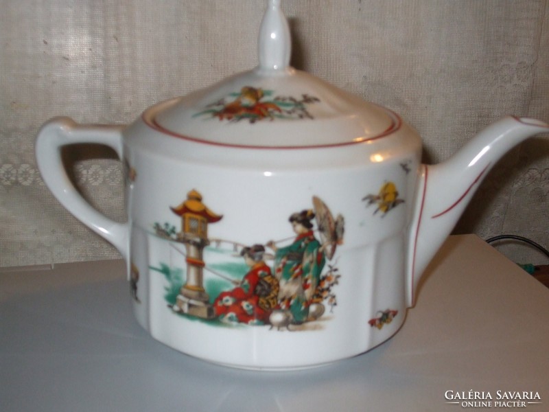 A beautiful hand-painted teapot with Japanese figures.E