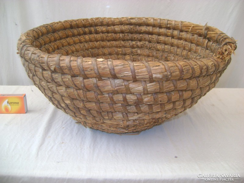 Old wicker basket with straw basket