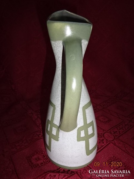 Glazed ceramic jug, height 18 cm. He has!