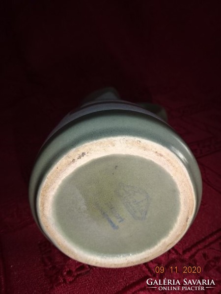 Glazed ceramic jug, height 18 cm. He has!