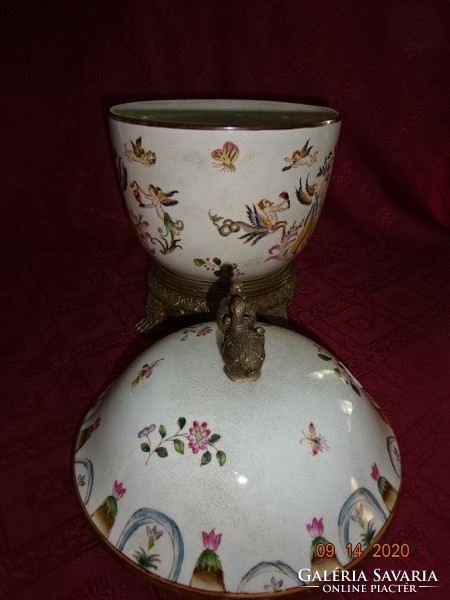 Oriental porcelain antique centerpiece with lid. With bronze base and handle. He has!