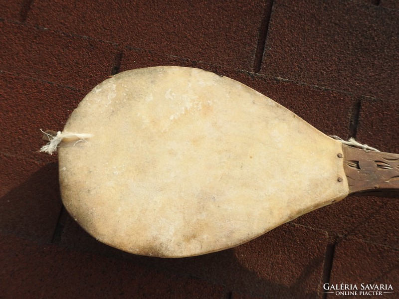 An old guzla instrument with a chamois head