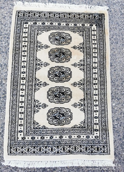 Kézi csomozású szőnyeg  (63x100cm)