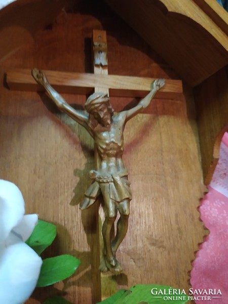 Wall wooden homemade altar with Jesus