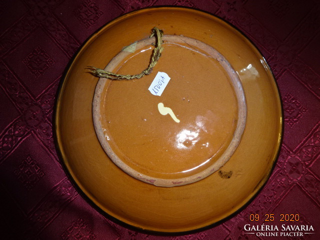 German glazed ceramic wall plate, diameter 22.5 cm. He has!