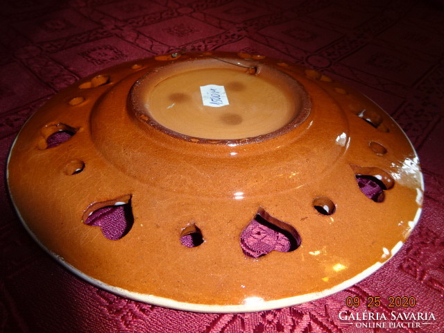 German glazed ceramic wall plate, diameter 18.5 cm. He has!