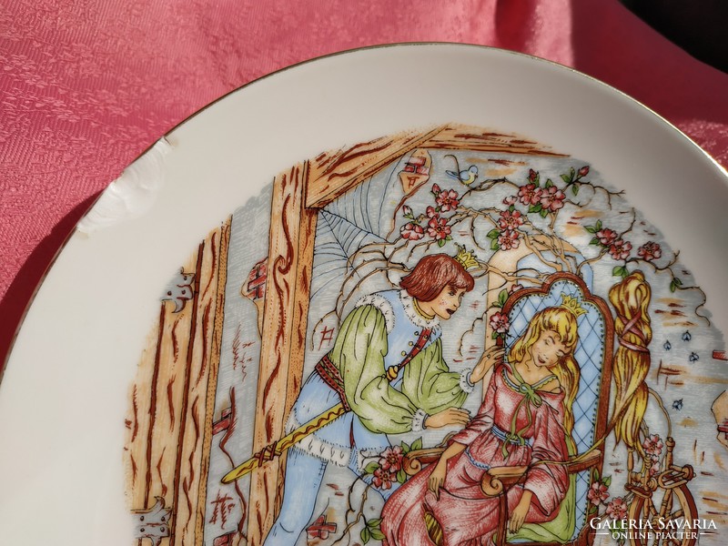 A tale of a rose rose on a porcelain decorative plate