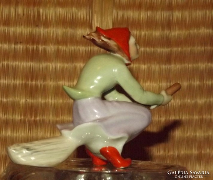 Antique porcelain witch from Kőbánya porcelain factory on her vehicle