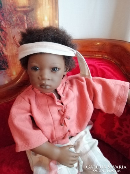 Baby art doll on vinyl
