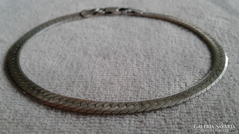 Marked, silver snake bracelet