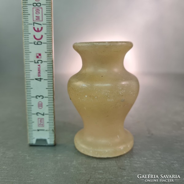 Small alabaster vase labeled 