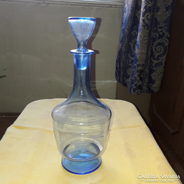 Engraved blue wine bottle with stopper