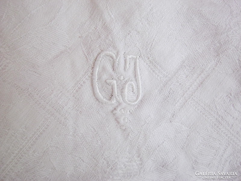 G. J. Monogrammed tablecloth cloth