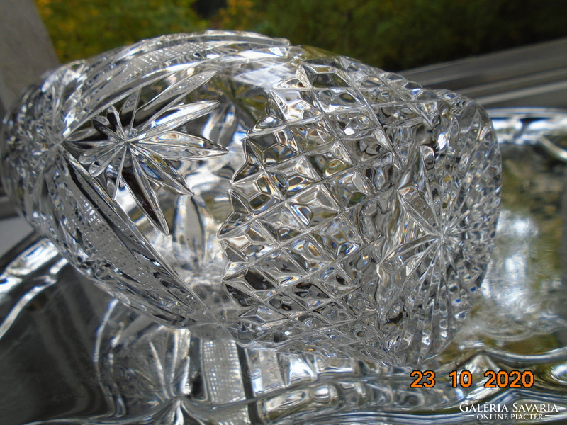 With rich diamond-cut elements, rosette and flower patterns, lead crystal vase