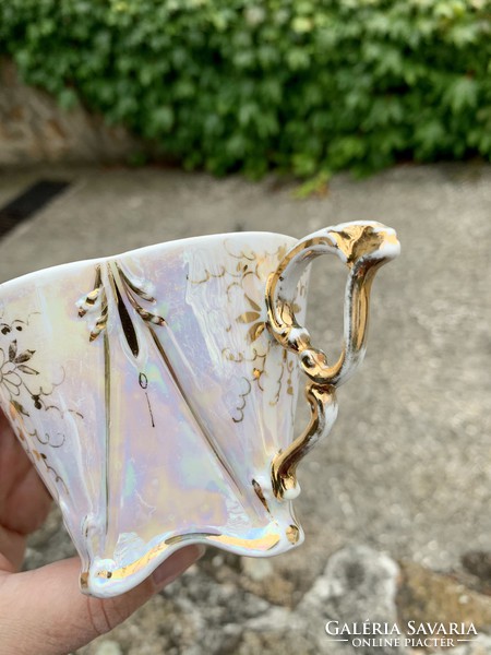 A 1950s set of gilt-painted hair-thin square porcelain cups and plates