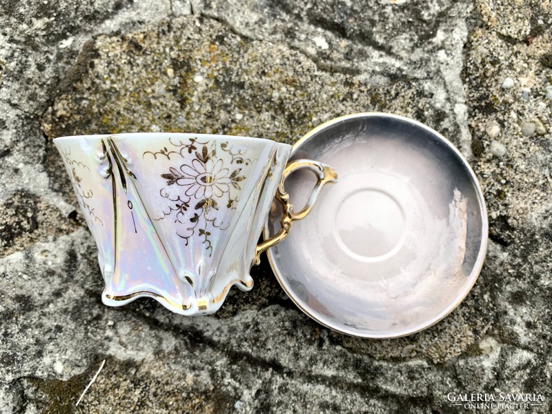 A 1950s set of gilt-painted hair-thin square porcelain cups and plates