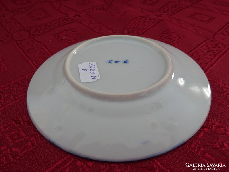 Japanese porcelain small plate, diameter 12.5 cm. He has!
