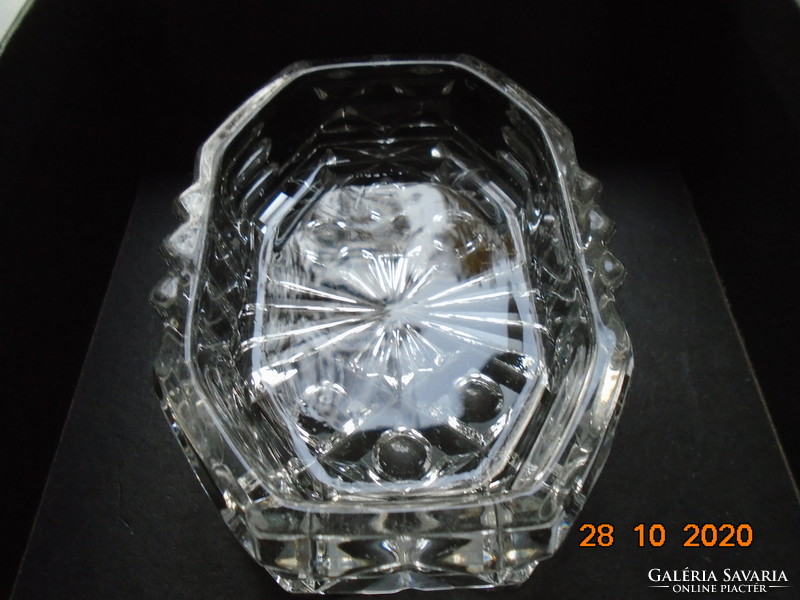 Polygonal lead crystal with a wide variety of ornate grindings