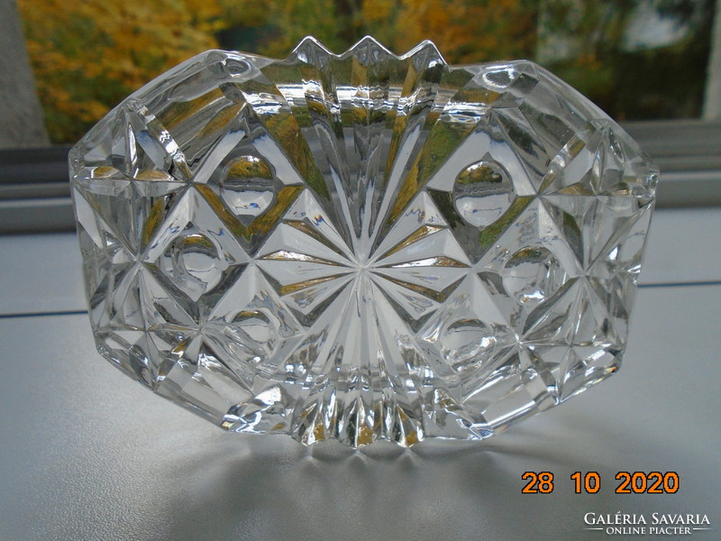Polygonal lead crystal with a wide variety of ornate grindings