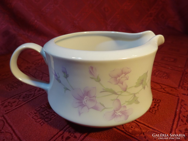 Lowland porcelain milk spout with pale purple flowers. He has!