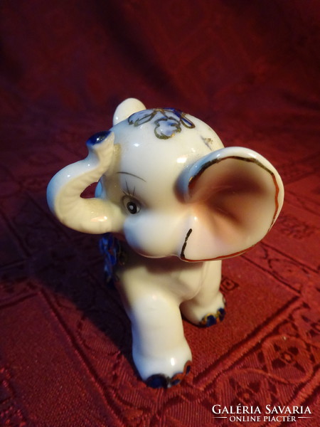 Em & em exclusive German porcelain elephant. Beautiful patterns and colors. He has!
