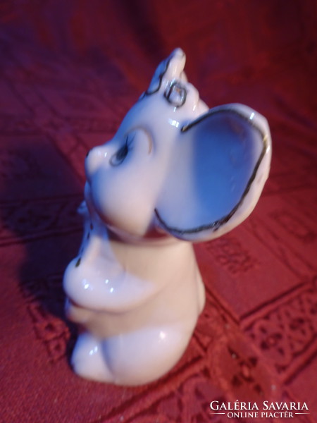 German porcelain mouse, trumpet pink mistress. He has!