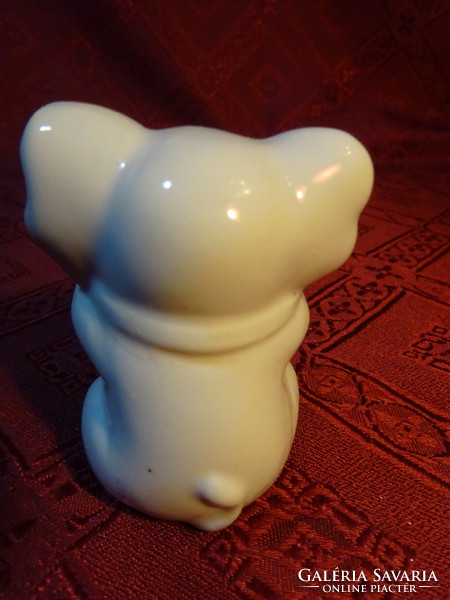 German porcelain elephant with pink bow, height 6.5 cm. He has!