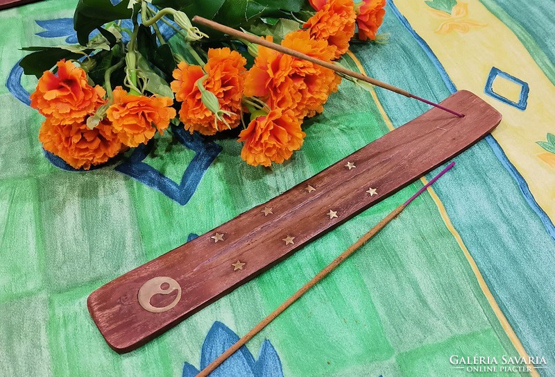 Wooden incense base decorated with copper yin yang symbol and stars