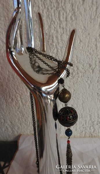 Special bronze sphere on a hanging chain with fire enamel painting