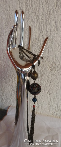 Special bronze sphere on a hanging chain with fire enamel painting