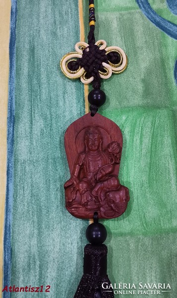 Real room. Rosewood pendant, amulet, samantabhadra bodhisattva