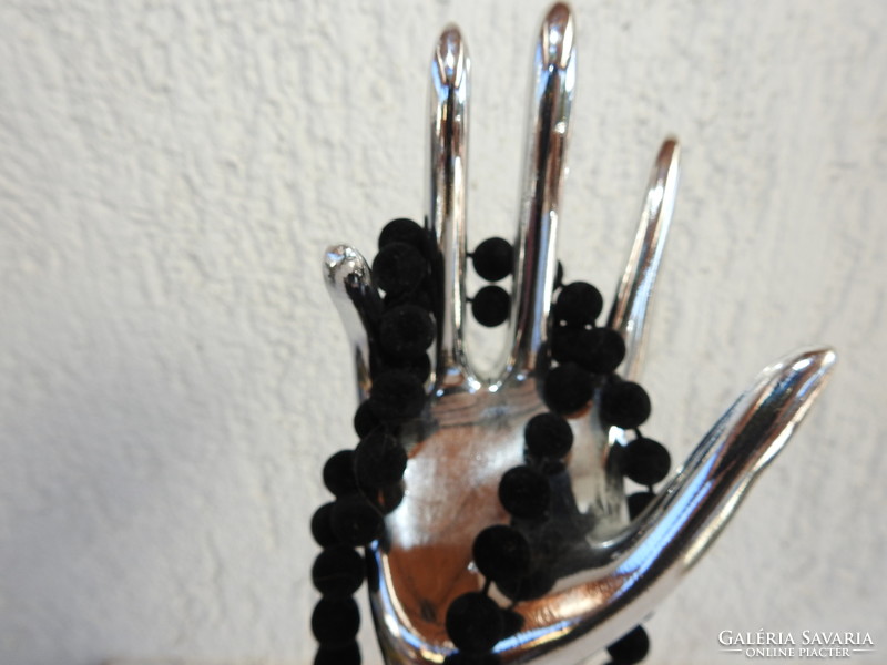 Black necklace made of velvet-covered spheres