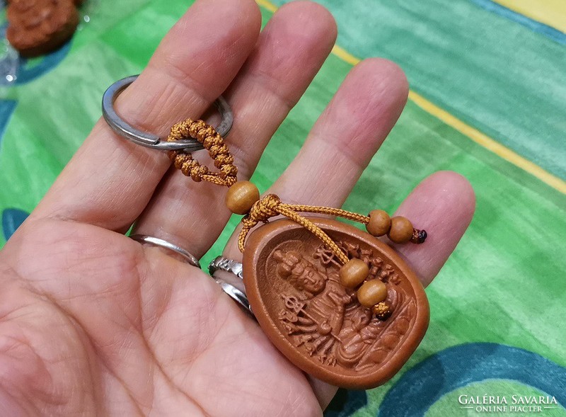 Real term.Rosewood key holder, avalokitesvara