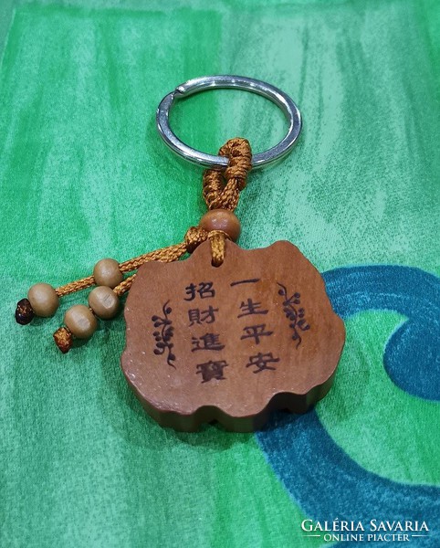 Real term. Feng shui rosewood keychain, material protection, material security