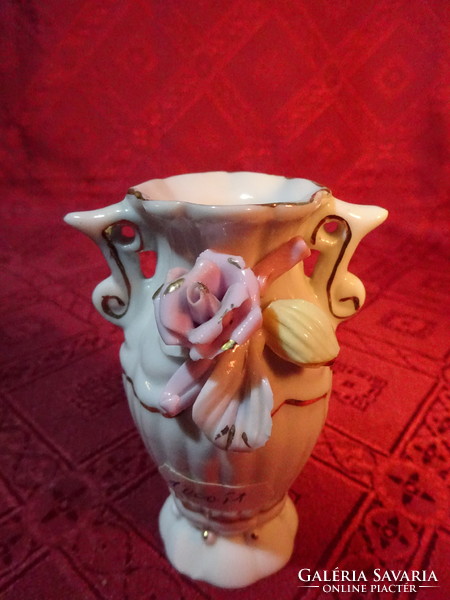 Porcelain vase with rose pattern, height 9 cm. He has!