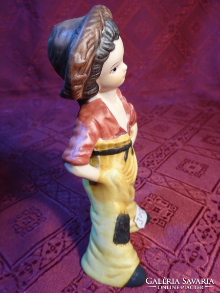 Porcelain figurine, boy with spotted pants, height 14 cm. He has!