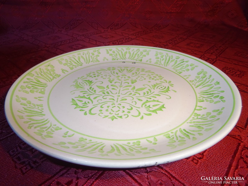 Granite porcelain wall plate with green folk motif. Its diameter is 19 cm. He has!