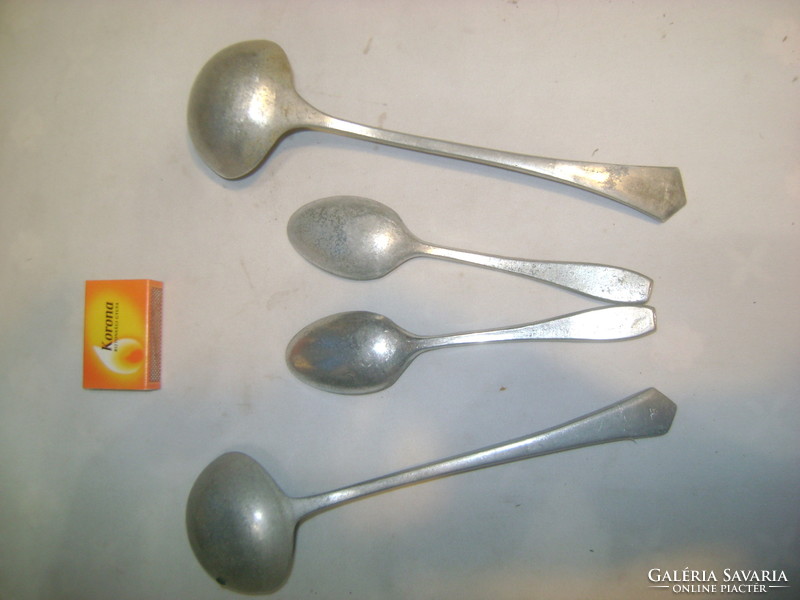 Two retro aluminum ladles and two children's spoons