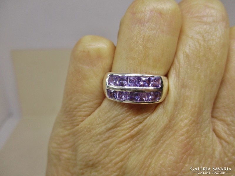 Beautiful silver ring with amethyst purple cubic zirconia stones