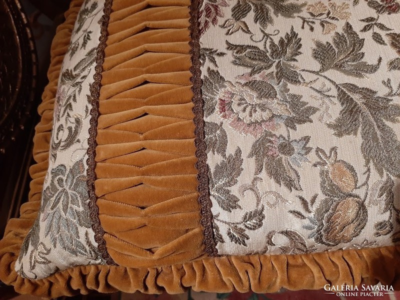 Decorative cushion combined with golden velvet