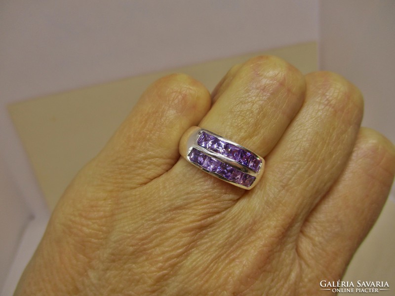 Beautiful silver ring with amethyst purple cubic zirconia stones