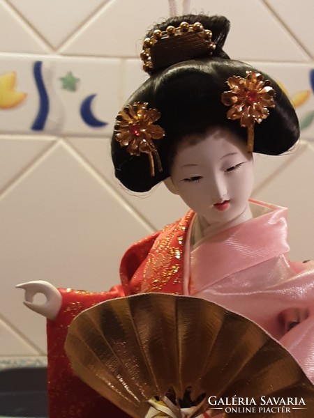 Japanese geisha porcelain doll - sophisticated, delicate workmanship