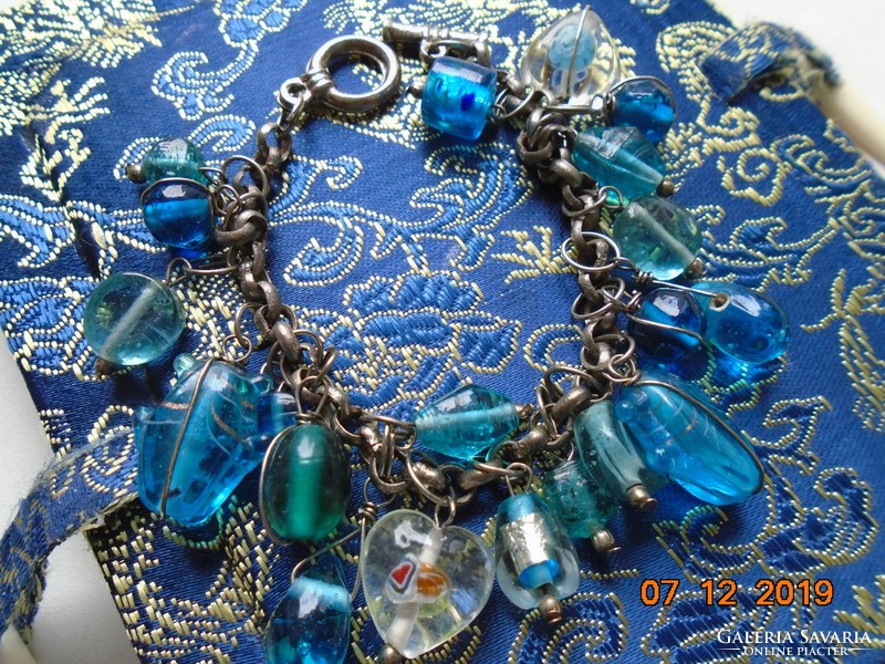 Handmade Murano glass bracelet with beads of various shapes and figures, with an interesting, secure clasp