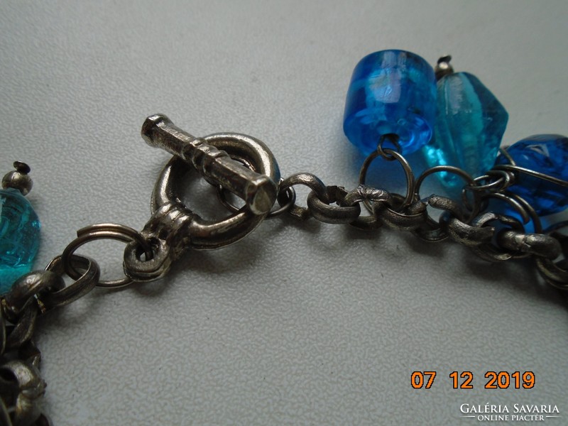 Handmade Murano glass bracelet with beads of various shapes and figures, with an interesting, secure clasp