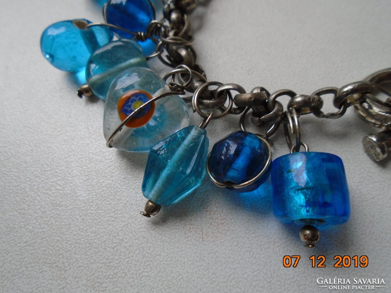 Handmade Murano glass bracelet with beads of various shapes and figures, with an interesting, secure clasp