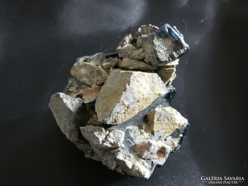 Natural raw vivianite crystals in the calcite-limestone parent rock. Transylvanian piece. 97 grams.