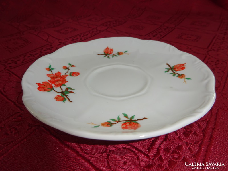 Zsolnay porcelain, orange floral coffee cup placemat. He has!