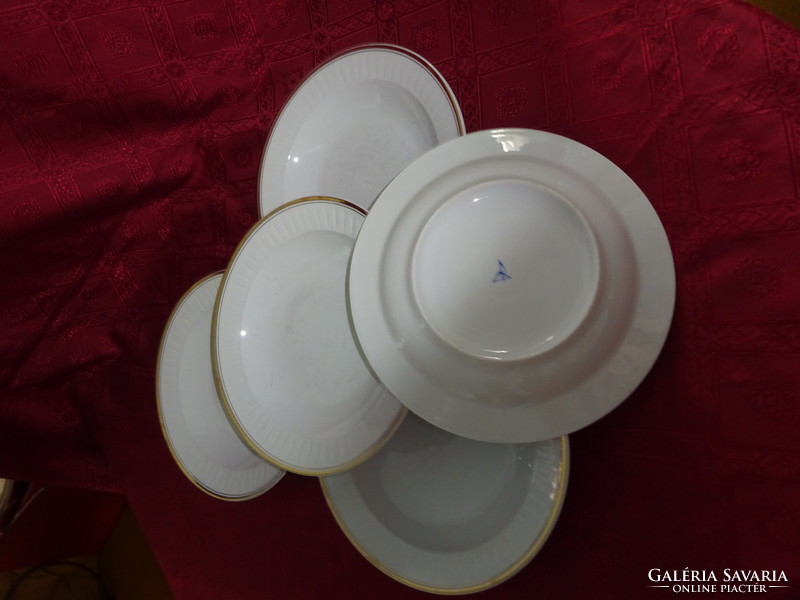 Lowland porcelain deep plate, gold edged, diameter 23.5 cm. He has!