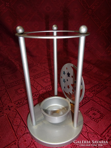 Metal candle holder, bottom diameter 9 cm, height 13.5 cm. He has!