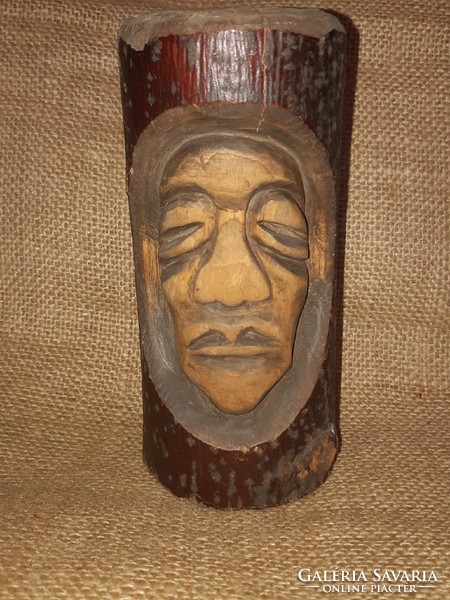 Carved head, carved face, wood carving